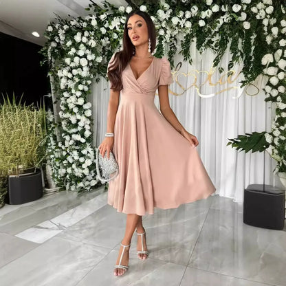 Robe femme – Coupe patineuse – Décolleté en V – Manches courtes bouffantes – Élégante