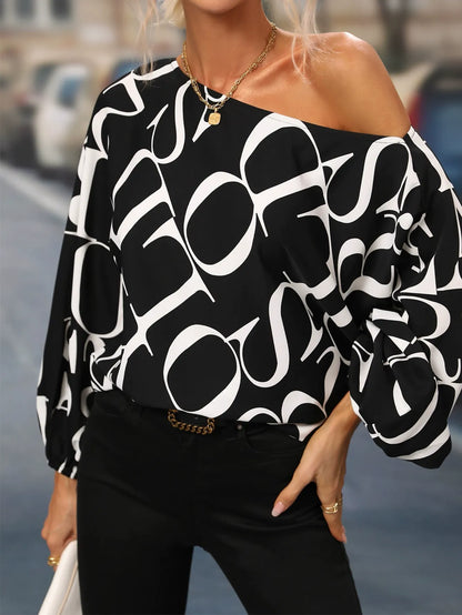 Haut femme asymétrique – Coupe ample – Manche lanterne – Imprimé audacieux