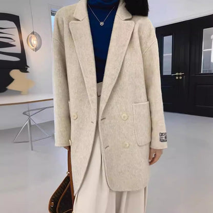 Manteau femme en laine – coupe oversize – double boutonnage – col tailleur