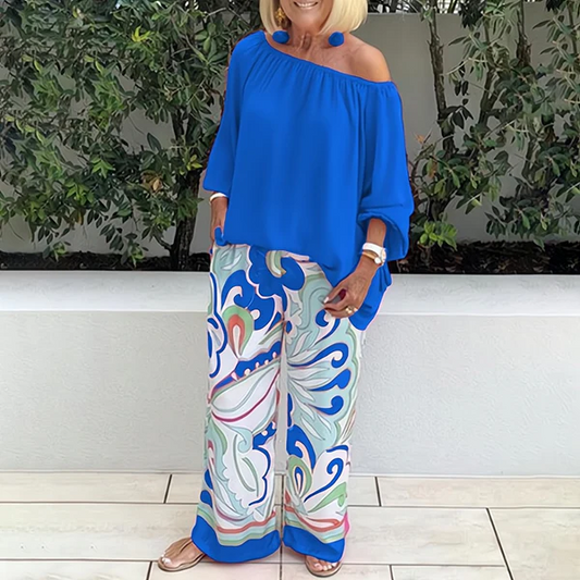 Blouse femme – Coupe ample – Épaules dénudées – Manches 3/4 – Détail pompons