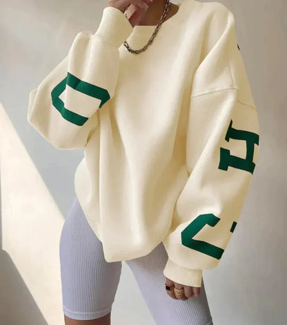 Sweatshirt femme – Coupe oversize – Coton doux – Épaules tombantes – Motif sur manche