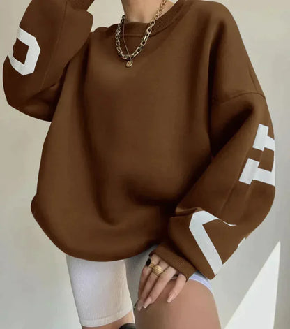 Sweatshirt femme – Coupe oversize – Coton doux – Épaules tombantes – Motif sur manche