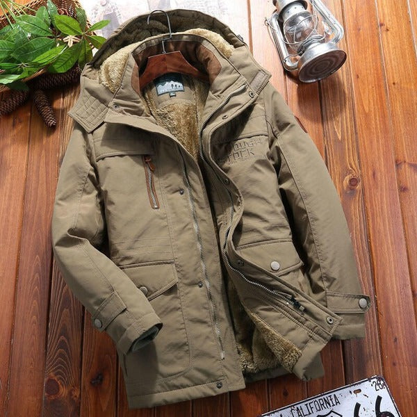 Veste homme oversize – Capuche – Épaules matelassées – Poches zippées – Doublure chaude