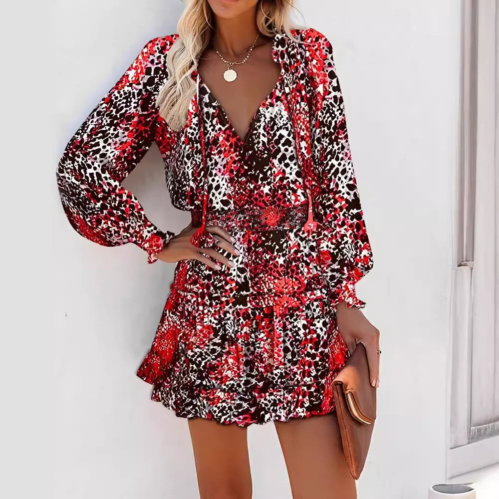 Robe femme – coupe évasée – manches longues – col en V – motif imprimé – taille smockée