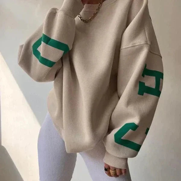 Sweatshirt femme – Coupe oversize – Coton doux – Épaules tombantes – Motif sur manche